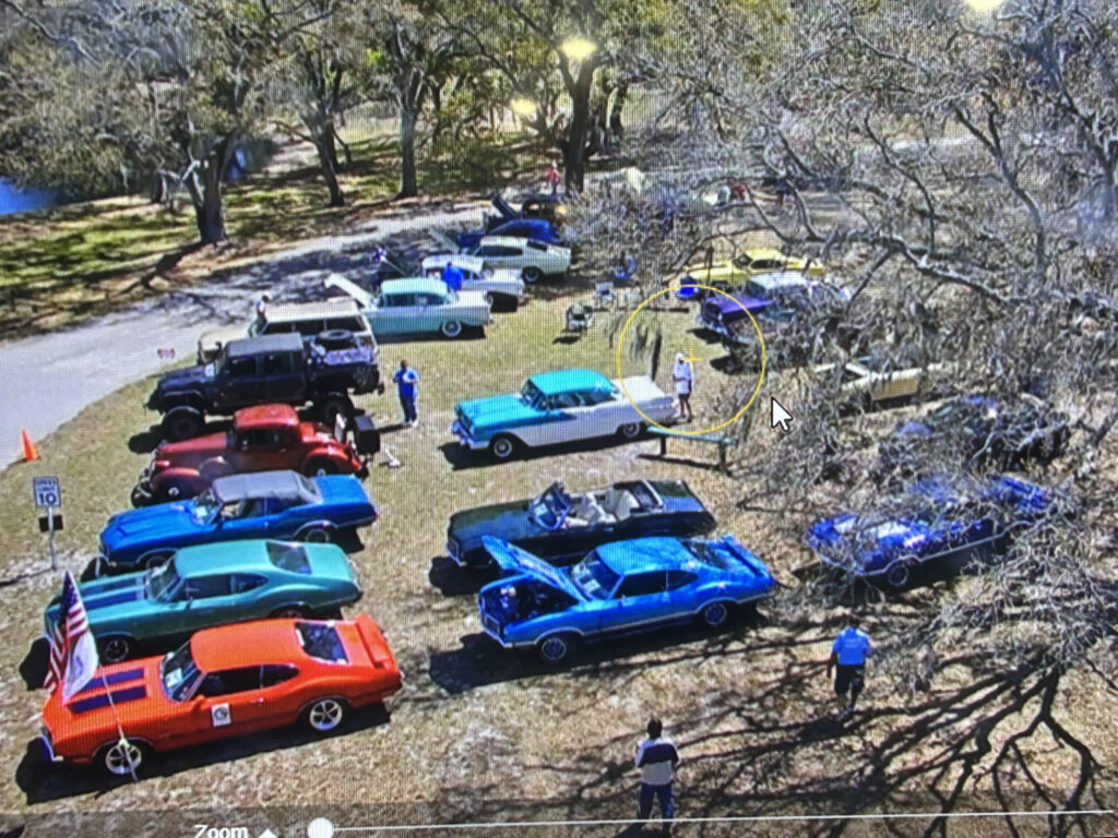 Field of Oldsmobiles from Sheriff's vehicle